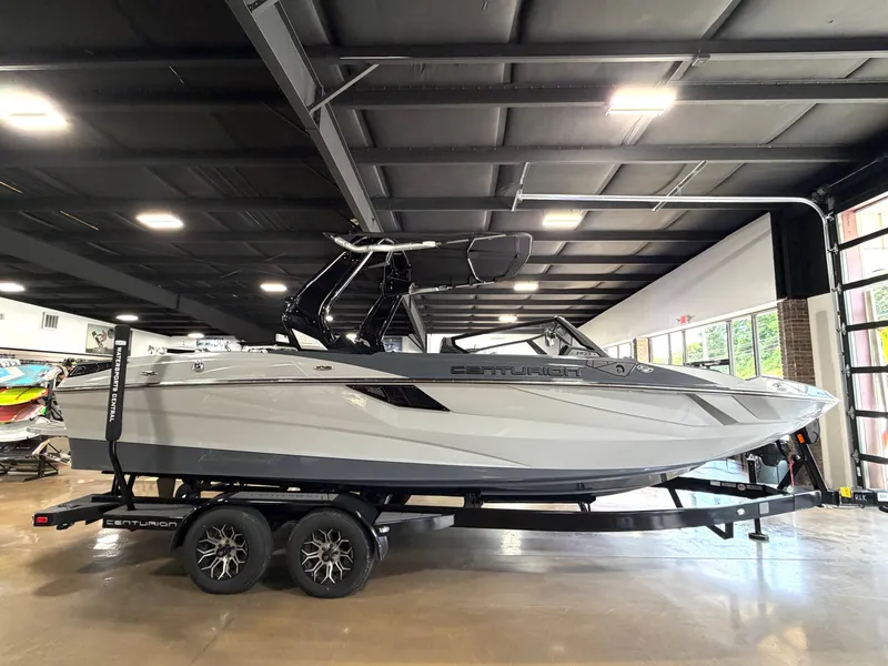 Slide: The Image of 2025 Centurion Fe23 boat indoors on a trailer. - 2