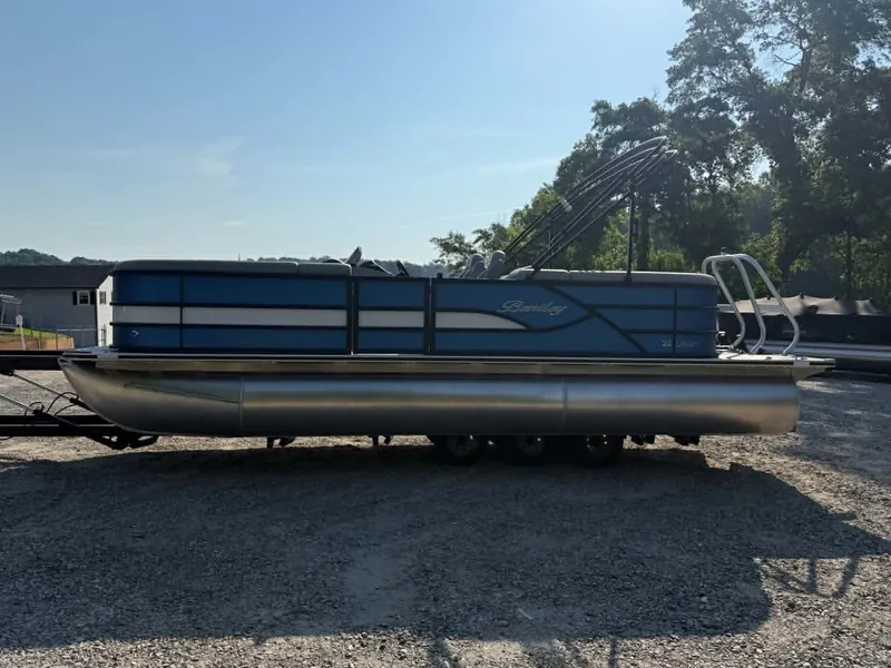 Slide: The Image of 2026 Bentley Pontoons Legacy 223 Navigator on gravel lot. - 10
