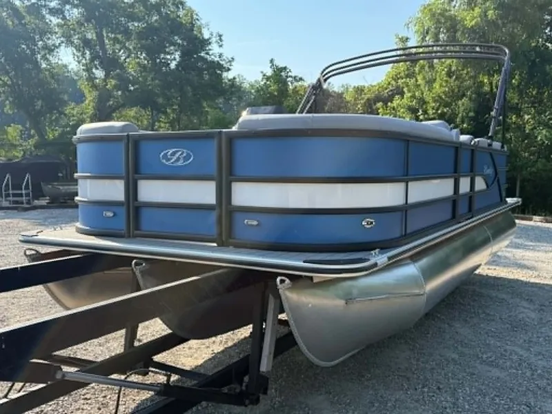 Slide: The Image of 2026 Bentley Pontoons Legacy 223 Navigator on trailer outdoors. - 12