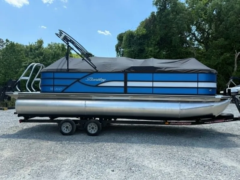 Slide: The Image of 2026 Bentley Pontoons Legacy 223 Navigator on trailer, covered. - 14