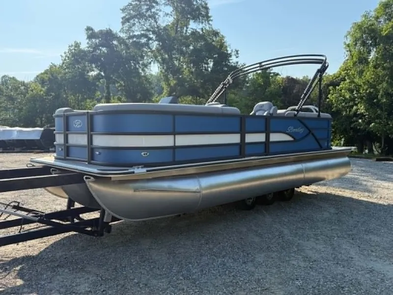 Slide: The Image of 2026 Bentley Pontoons Legacy 223 Navigator on trailer outdoors. - 15