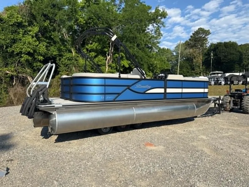 Slide: The Image of 2026 Bentley Pontoons Legacy 223 Navigator on gravel surface. - 20