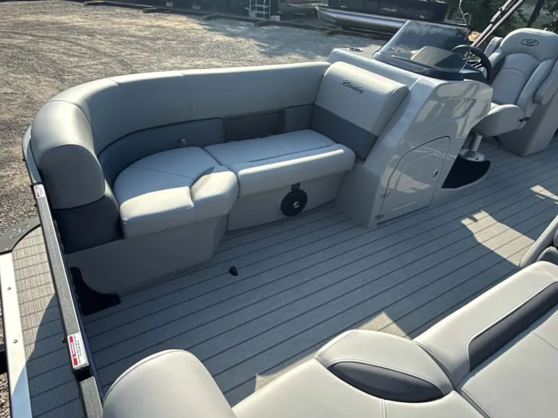 Slide: The Image of Interior of 2026 Bentley Pontoons Legacy 223 Navigator with gray seating. - 6