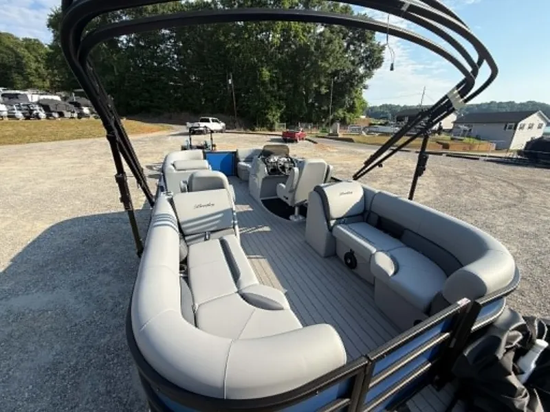 Slide: The Image of 2026 Bentley Pontoons Legacy 223 Navigator with gray seating outdoors. - 8