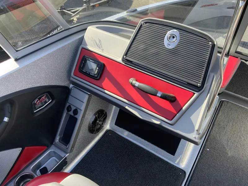 Slide: The Image of Interior of 2018 Ranger 1850MS Reata boat with red dashboard. - 14