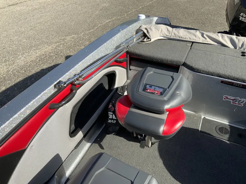 Slide: The Image of Interior of a 2018 Ranger 1850MS Reata boat with gray and red seating. - 16