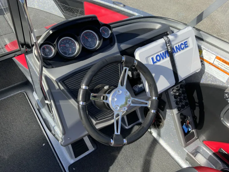 Slide: The Image of Dashboard of a 2018 Ranger 1850MS Reata boat with Lowrance device. - 2