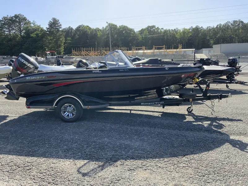 Slide: The Image of 2018 Ranger 1850MS Reata boat on trailer outdoors. - 3