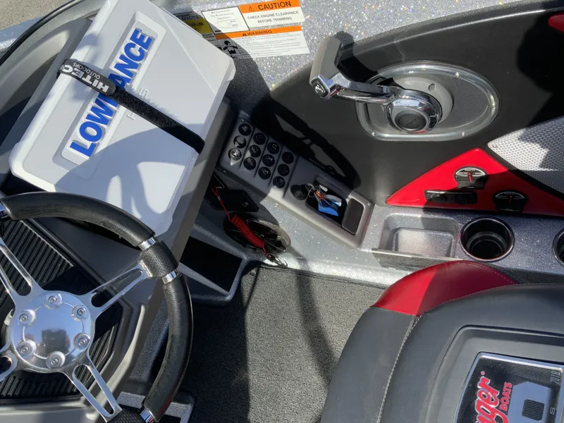 Slide: The Image of Interior view of a 2018 Ranger 1850MS Reata boat with controls and Lowrance device. - 4