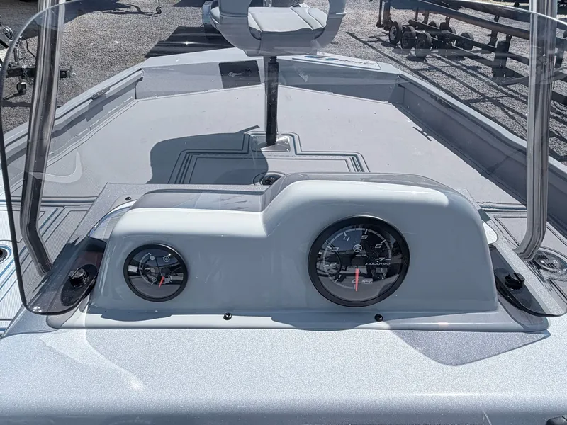 Slide: The Image of 2026 G3 Gator Tough 20CCJ DLX boat console with gauges. - 24