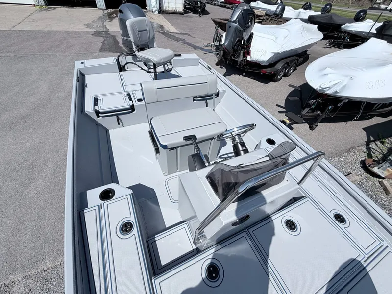 Slide: The Image of 2026 G3 Gator Tough 20CCJ DLX boat on a parking lot. - 25
