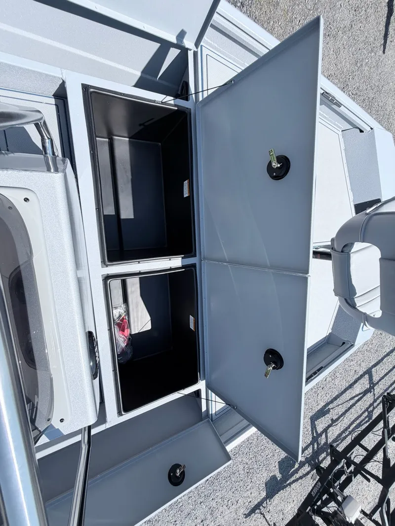 Slide: The Image of Open storage compartments on G3 Gator Tough 20CCJ DLX boat, year 2026. - 26