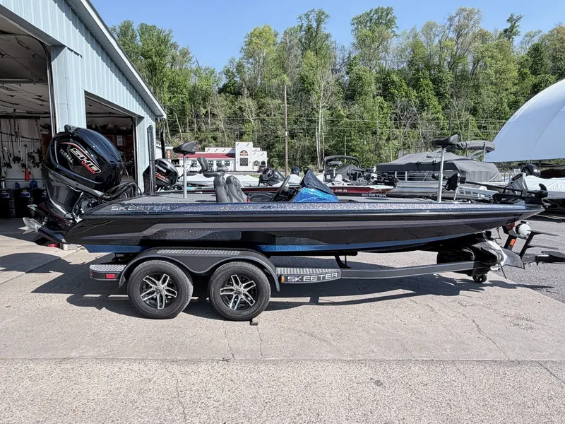 The Image of 2022 Skeeter ZX200 boat on trailer outside workshop. - 1