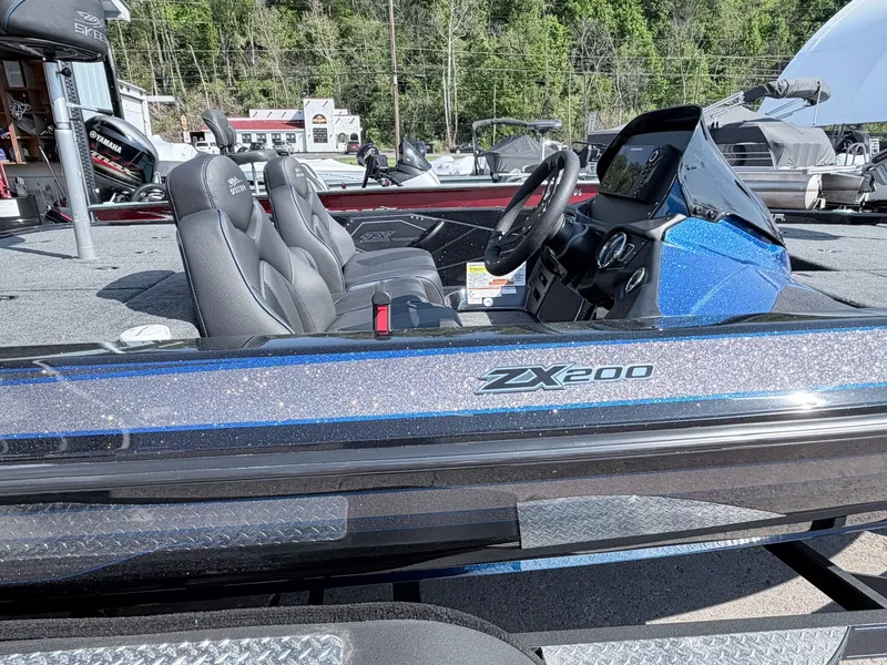 Slide: The Image of 2022 Skeeter ZX200 boat with blue glitter finish and luxury seating. - 12