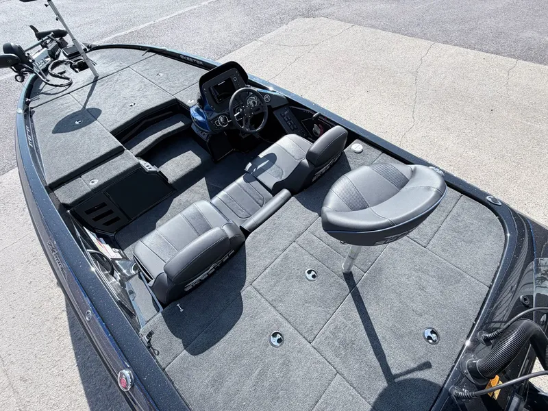 Slide: The Image of Interior view of a 2022 Skeeter ZX200 boat with gray seating. - 15