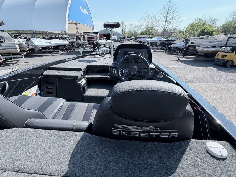 Slide: The Image of Interior view of a 2022 Skeeter ZX200 boat in a parking lot. - 19