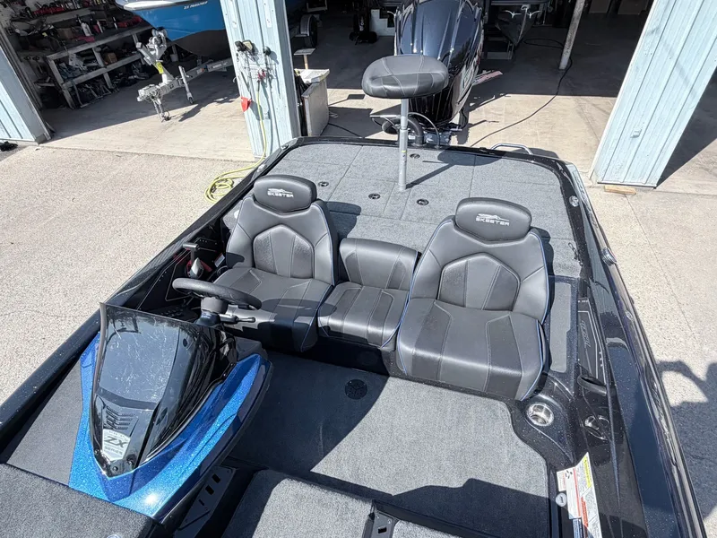 Slide: The Image of 2022 Skeeter ZX200 boat with gray seats and steering console. - 20