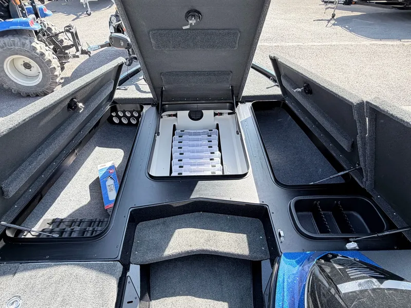 Slide: The Image of Interior view of a 2022 Skeeter ZX200 boat with storage compartments. - 5