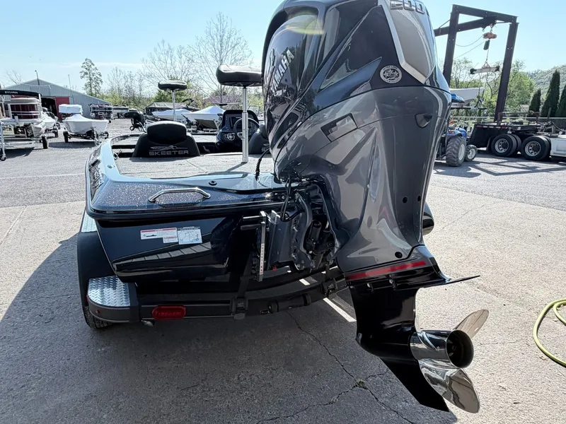 Slide: The Image of 2022 Skeeter ZX200 boat with powerful outboard motor. - 6