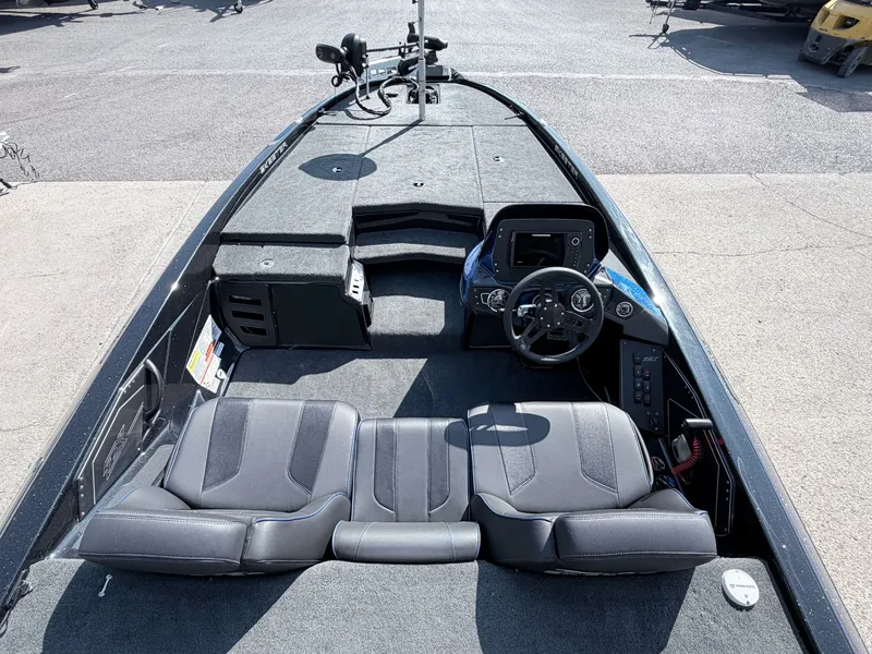 Slide: The Image of Interior of a 2022 Skeeter ZX200 boat with steering console. - 7
