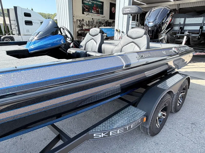 Slide: The Image of 2022 Skeeter ZX200 boat on trailer in workshop. - 9