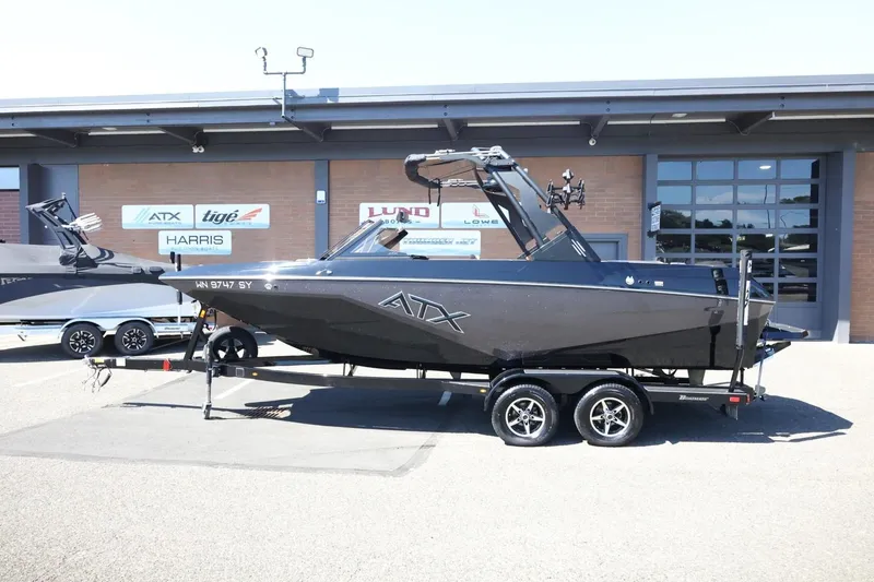 The Image of 2021 ATX Surf Boats 22 Type-S on trailer outside dealership. - 0