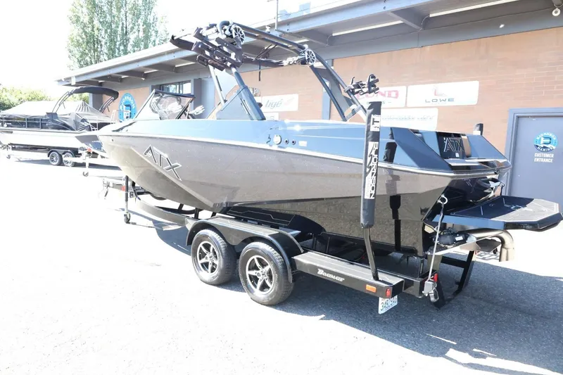 Slide: The Image of 2021 ATX Surf Boats 22 Type-S on trailer, parked outdoors. - 10