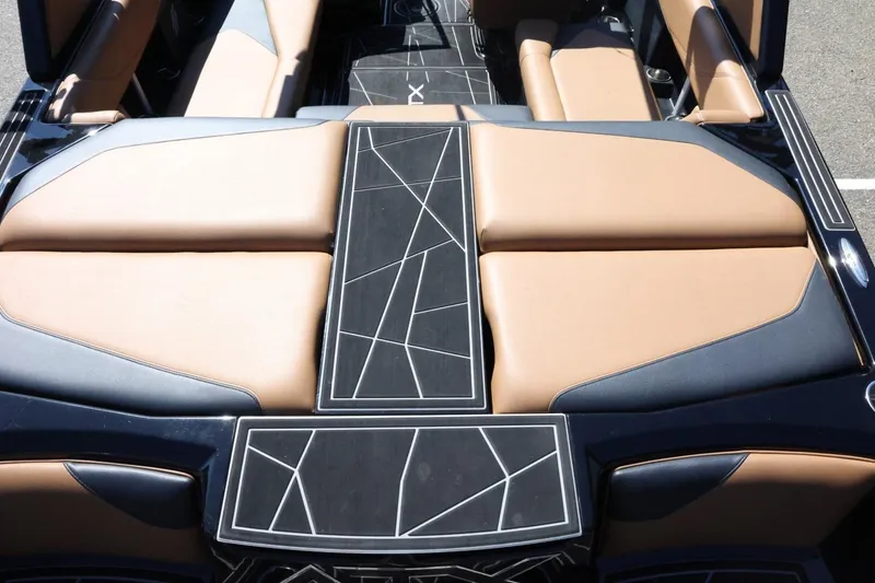 Slide: The Image of 2021 ATX Surf Boats 22 Type-S interior with tan and black geometric design. - 11