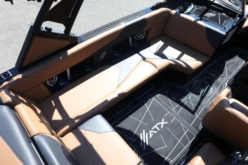 Slide: The Image of Interior of 2021 ATX Surf Boats 22 Type-S with tan seating and stylish flooring. - 15