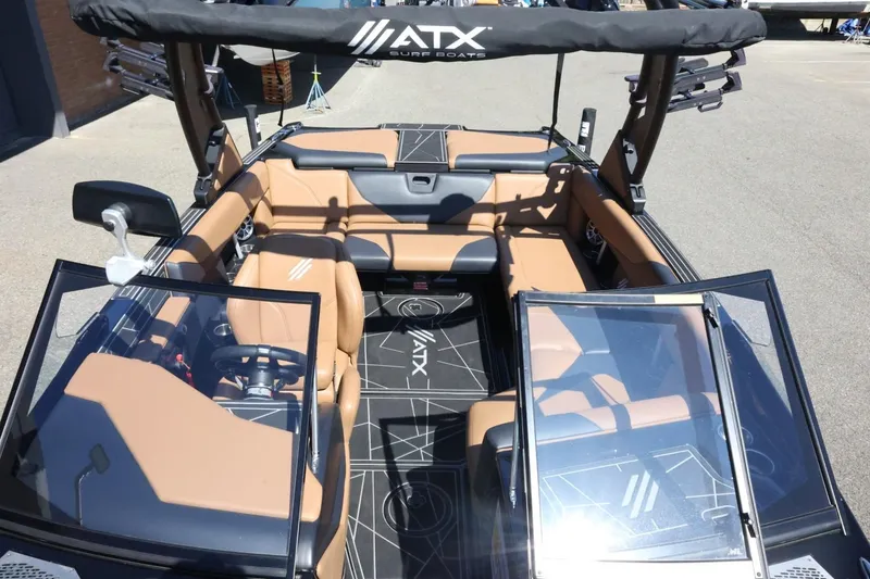 Slide: The Image of 2021 ATX Surf Boats 22 Type-S interior with tan seating and modern design. - 22