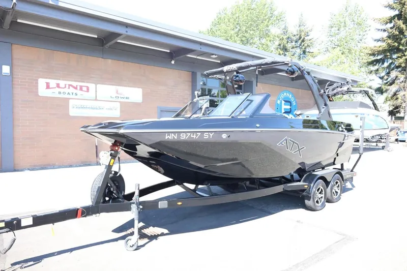 Slide: The Image of 2021 ATX Surf Boats 22 Type-S on trailer outside dealership. - 3