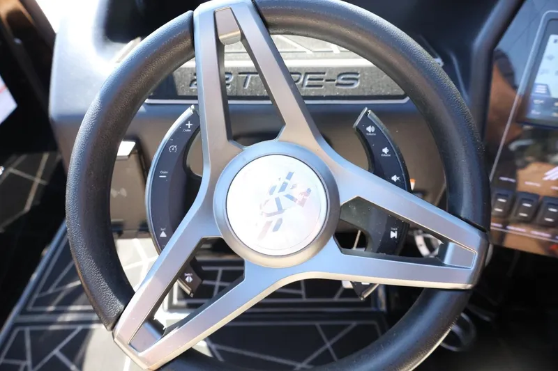 Slide: The Image of Steering wheel of 2021 ATX Surf Boats 22 Type-S with control buttons. - 30