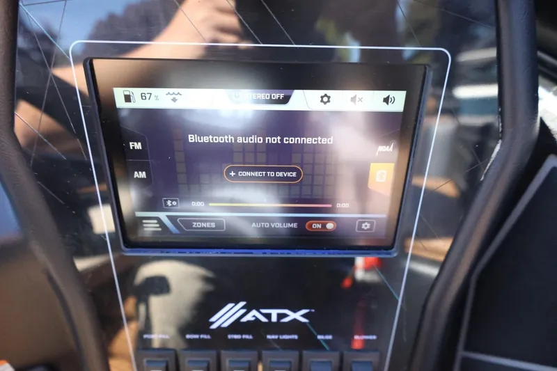 Slide: The Image of ATX Surf Boats 2021 dashboard display showing Bluetooth audio not connected. - 32