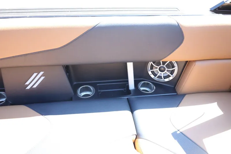 Slide: The Image of 2021 ATX Surf Boats 22 Type-S interior with speaker and cup holders. - 34