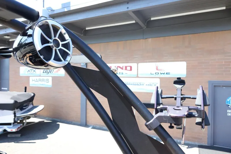 Slide: The Image of 2021 ATX Surf Boats 22 Type-S with speaker and wakeboard rack, outdoor display. - 37