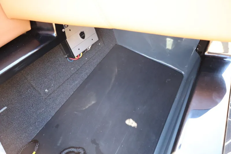Slide: The Image of Interior storage compartment of 2021 ATX Surf Boats 22 Type-S with wiring visible. - 40