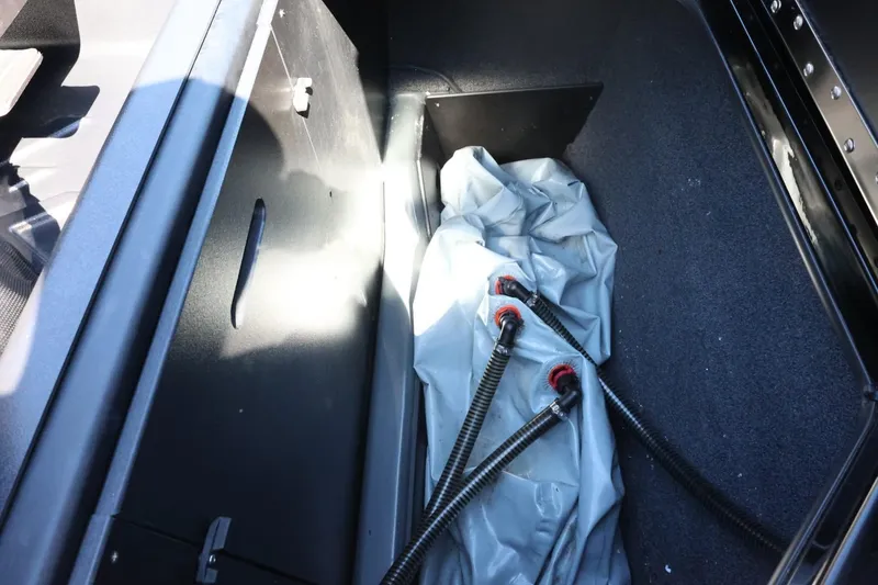 Slide: The Image of 2021 ATX Surf Boats 22 Type-S ballast compartment with hoses and fittings. - 46