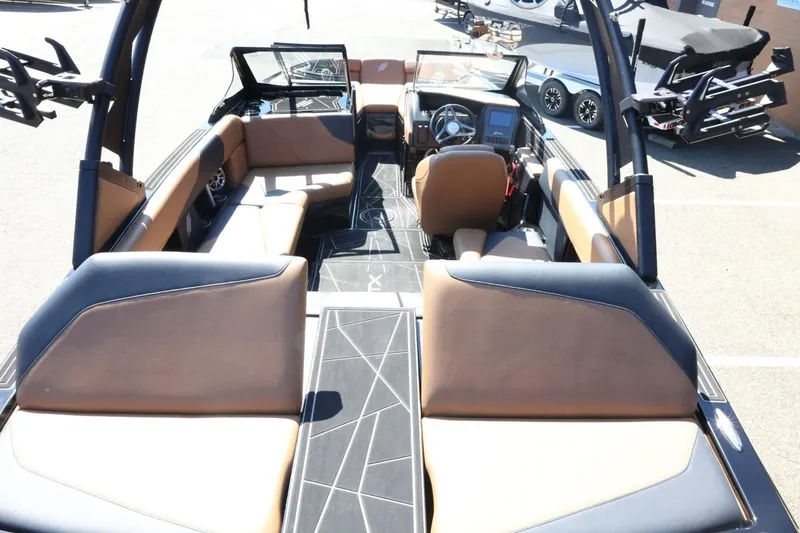 Slide: The Image of 2021 ATX Surf Boats 22 Type-S interior with sleek seating and modern dashboard design. - 49