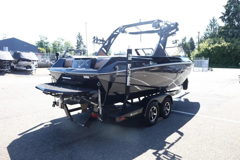 Slide: The Image of 2021 ATX Surf Boats 22 Type-S on trailer, parked outdoors in a sunny lot. - 8