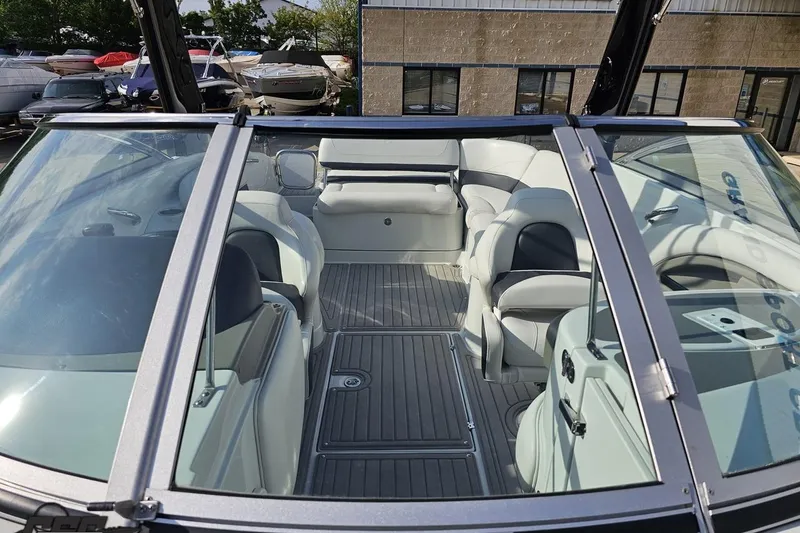 Slide: The Image of 2019 Crownline 275 SS boat interior with sleek seating and modern design. - 102