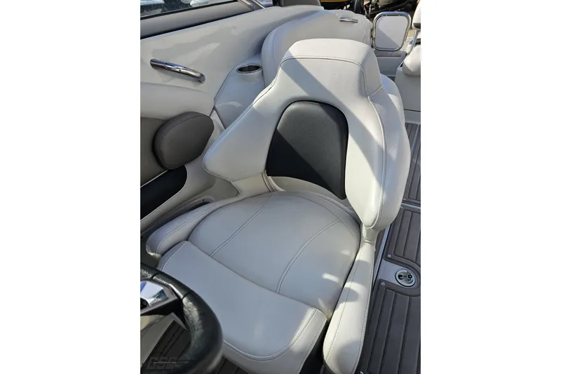 Slide: The Image of 2019 Crownline 275 SS boat seat with white and black upholstery. - 106