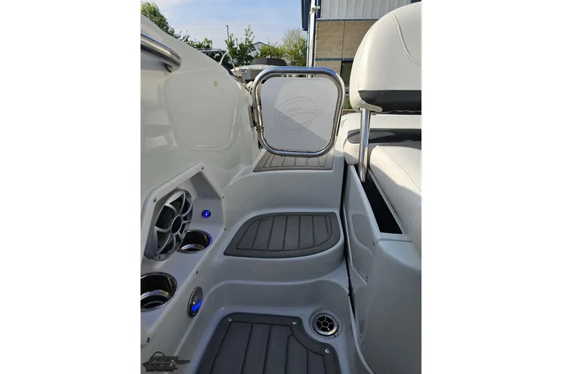 Slide: The Image of 2019 Crownline 275 SS boat interior with seating and speaker system. - 116