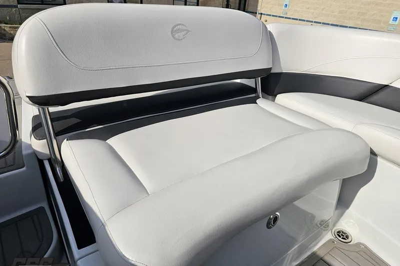 Slide: The Image of 2019 Crownline 275 SS boat interior seating with white upholstery and sleek design. - 119