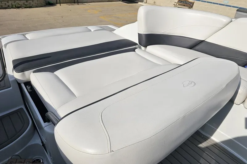 Slide: The Image of 2019 Crownline 275 SS boat with sleek white and black seating design. - 120