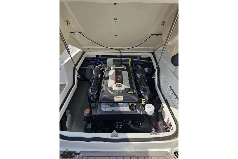 Slide: The Image of 2019 Crownline 275 SS boat engine compartment with 300 HP engine. - 121