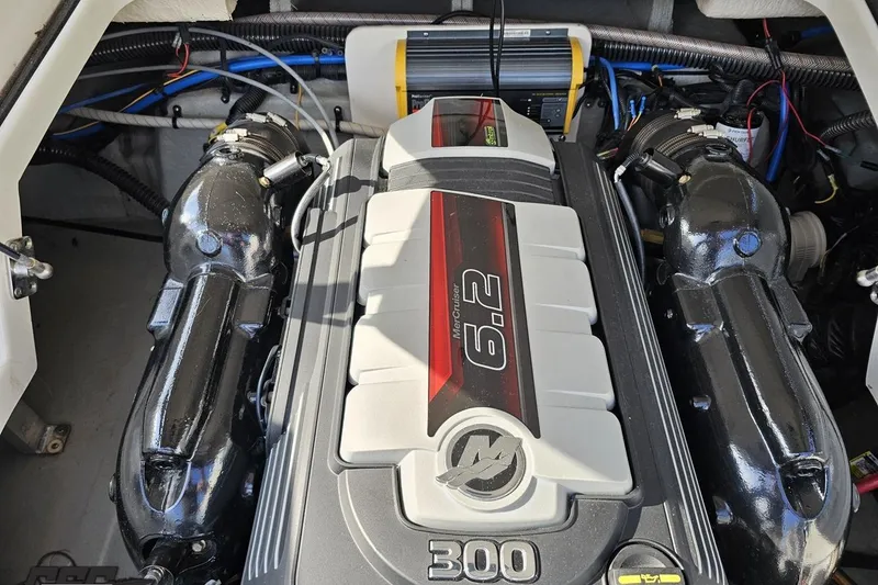 Slide: The Image of Engine compartment of a 2019 Crownline 275 SS boat featuring a MerCruiser 6.2 engine. - 122
