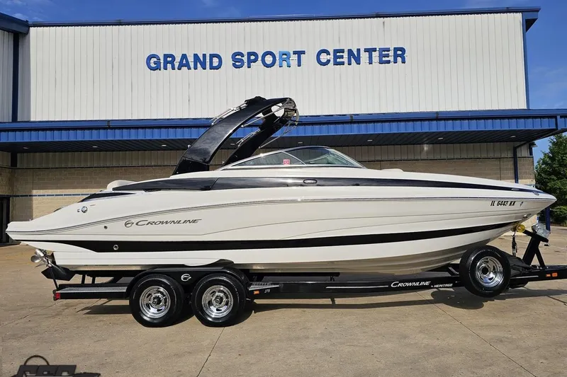 Slide: The Image of 2019 Crownline 275 SS boat on trailer at Grand Sport Center. - 2