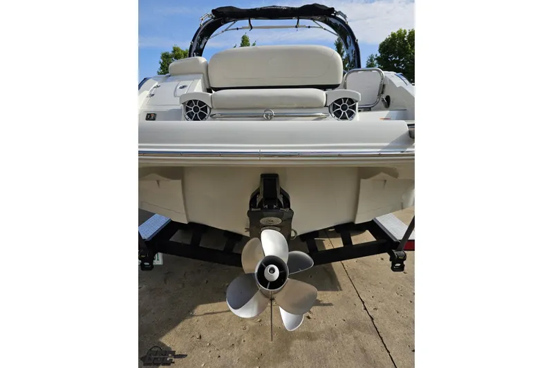 Slide: The Image of 2019 Crownline 275 SS boat rear view with propeller and seating. - 38