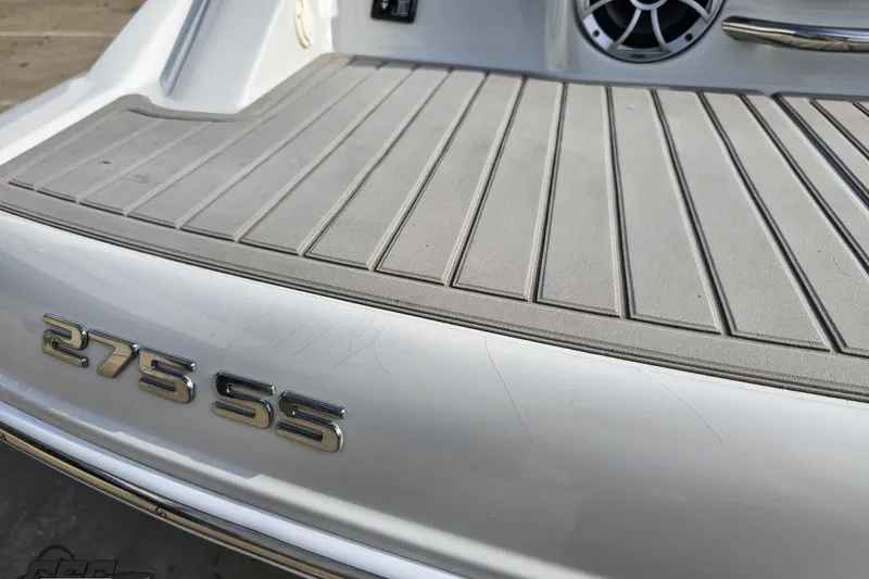 Slide: The Image of 2019 Crownline 275 SS boat deck with model emblem and speaker. - 41