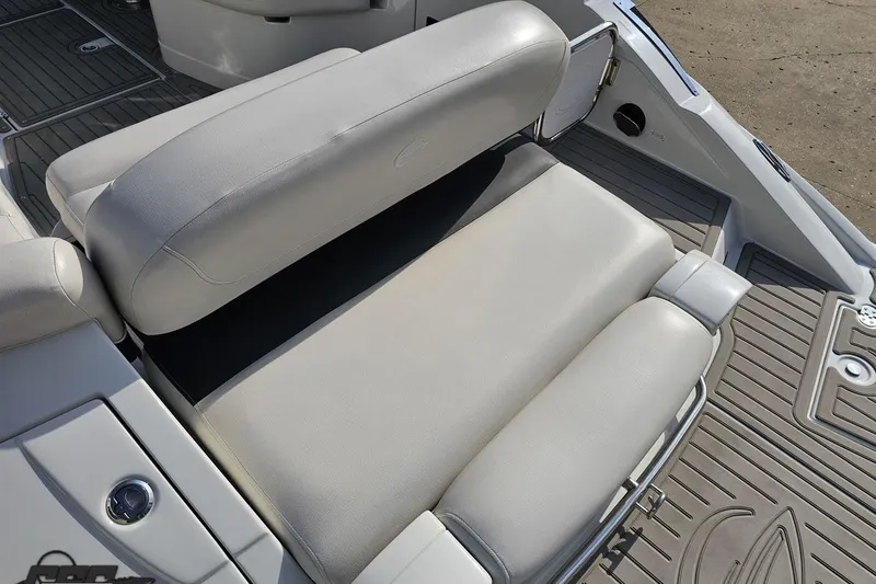 Slide: The Image of 2019 Crownline 275 SS boat interior seating with gray upholstery and deck details. - 45